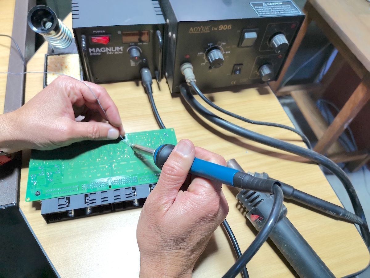Soldering and hot-air rework stations used for BMW and MINI footwell module repair