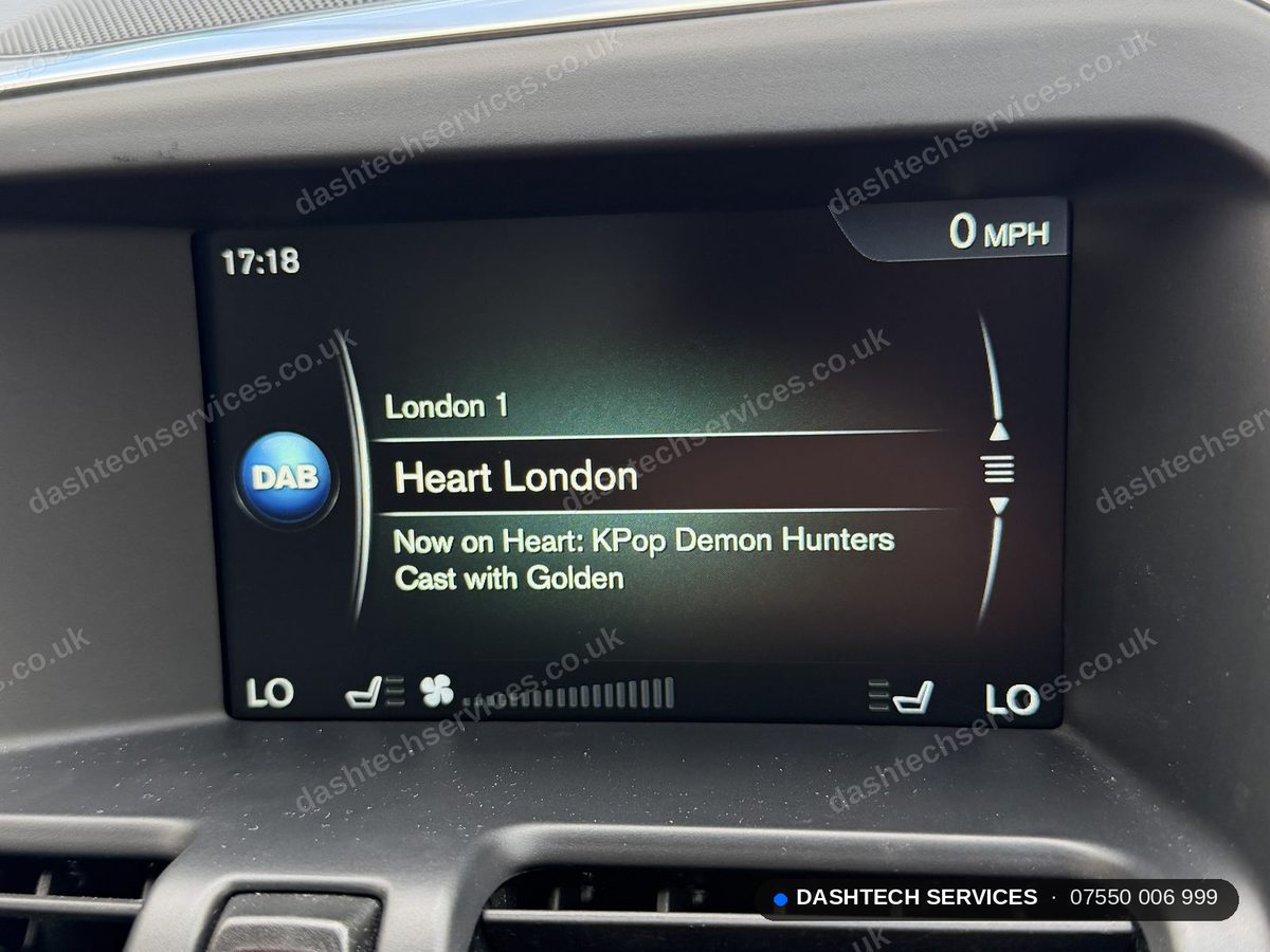 After repair: 2017 Volvo XC60 Sensus Connect screen working normally, showing DAB radio, clock and climate information